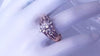 CHANNEL SET COCKTAIL DIAMOND RING WITH PEAR CUT CENTRE