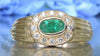 DIAMOND AND EMERALD OVAL CLUSTER RING